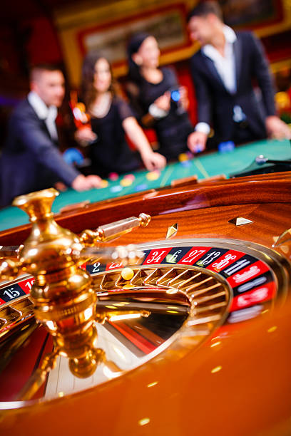 Live dealer rolling dice in Sic Bo Dadu cage on magic4d login